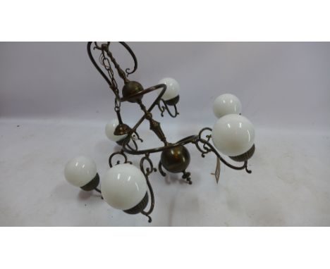 A Dutch style chandelier, having a spiral design with six spherical shades H 80 x W 90 x D 90cm 