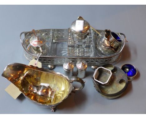 A silver topped inkwell together with a silver cruet set and some silver plated items 