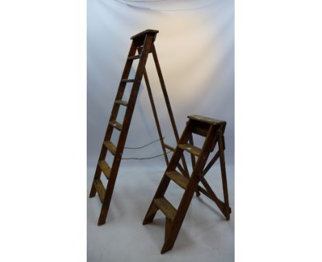 A rustic stepladder together with a smaller example, the taller ladder 190cm high 