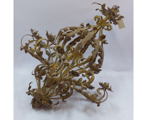 An 18th century style French wrought iron twelve branch chandelier with leaf and flower decoration, H 105cm 
