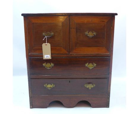 A Georgian style mahogany chest with two cupboard doors above two drawers and raised on carved bracket feet, H 75  x W 70 x D