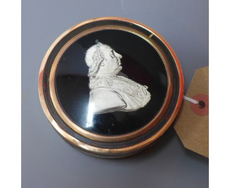 An early 19th century French gold mounted tortoiseshell snuff box, the top set with a cameo portrait, Baccarat 1825, provenan