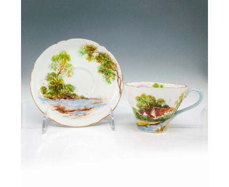 Hand painted design of countryside around mill with stream. Gilt edge rim on both. Light blue colored handle on cup. Shelley 