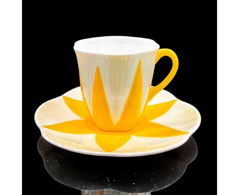 Vintage white bone china with yellow sunburst design. Dainty shape. Cup 3"L x 2.25"W x 2.25"H. Saucer 0.75"H x 4.75"dia. Shel