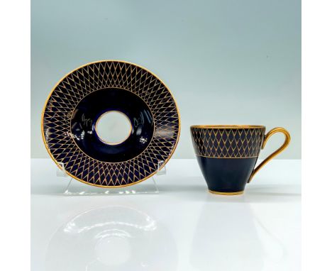 Navy blue with gold painted rims and stripes throughout the design. Rosenthal backstamp. Dimensions of cup: 3.5"L x 2.5"W x 2