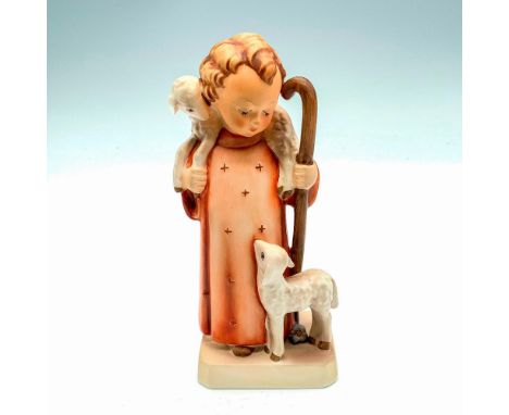 Matte porcelain, hand painted. Child in red robe standing with two lambs. M. I. Hummel inscribed on base. Goebel backstamp. I