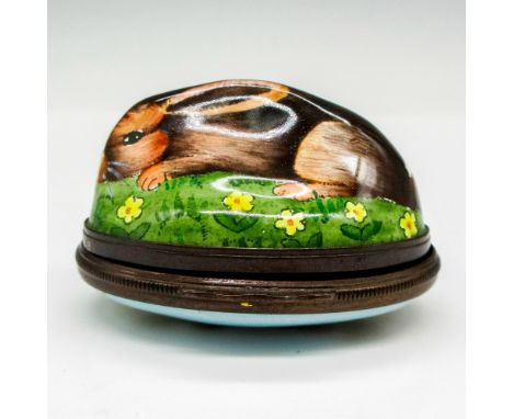Hand painted enamel box with hinged opening with brown rabbit in field of flowers. Bottom has rabbit scene in meadow. Halcyon
