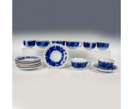 Eight generously sized coffee cups with matching saucers, adorned in a delicate flow blue floral design, scalloped edges, and