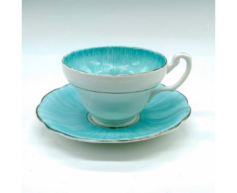White and light blue bone china teacup and saucer decorated with flowers and gold trim. Cup: 4.5"L x 3.75"W x 2.5"H. Saucer: 