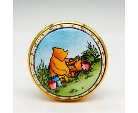 Hand painted enamel box with gilded edge screw top displaying scene of Pooh with honey pots. Halcyon Days backstamp. This ite