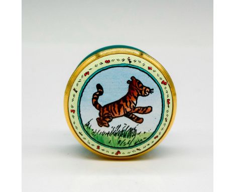 Hand painted miniature enamel box with gilded edge screw top displaying Tigger. Halcyon Days backstamp. This item has its ori