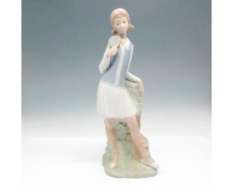 Matte finish figural colored in light colors of cream, blue and grey. NAO backstamp. Issued: 20th centuryDimensions: 4"L x 4"