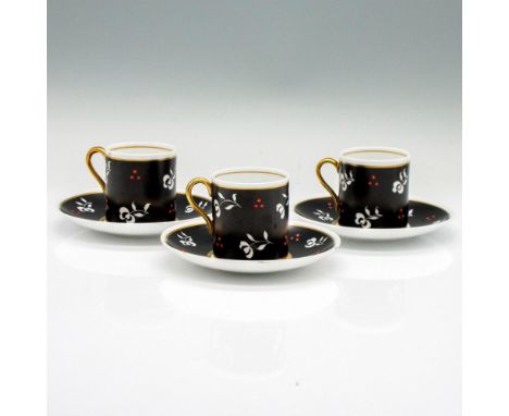 Shelly's signature mocha coffee shaped cups and saucers. Hand painted gold handles with gold banding on cups and saucers. Whi