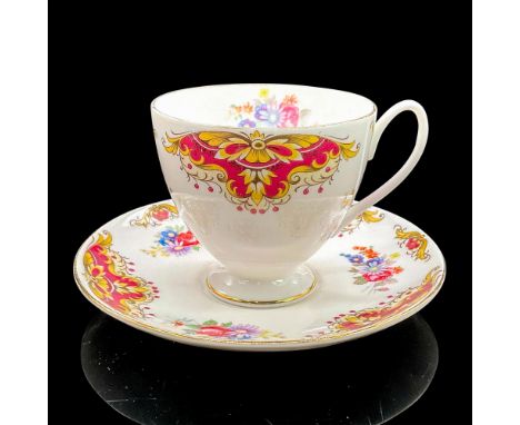 Vintage white bone china with red, yellow, white, blue and purple flowers, gilt rims. Carlisle shape. Tea cup 4"L x 3.25"W x 