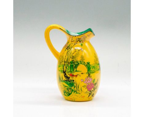 Vintage hand painted Bone China Chinoiserie pitcher. Yellow with green interior. Shelly England backstamp. Dimensions: 3"L x 