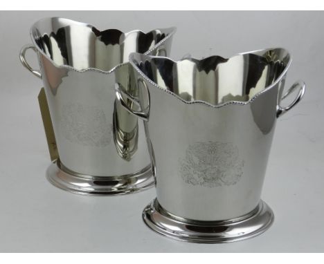 A pair of silver plated wine coolers, having etched foliate design to front and back. H.23cm (2)