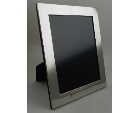 A sterling silver picture frame. Overall H: 32cm, W: 27cm