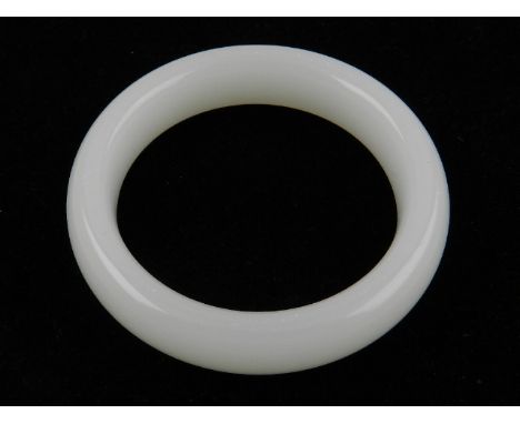 A white jadeite bangle.