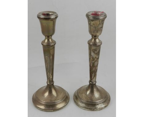 A pair of silver candlesticks, hallmarked Birmingham 1993. H.24cm