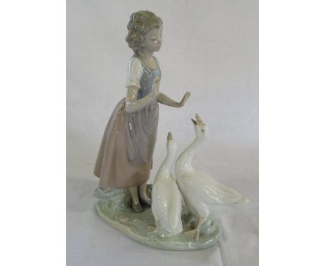 Nao figurine of a young girl with geese H 28.5 cm