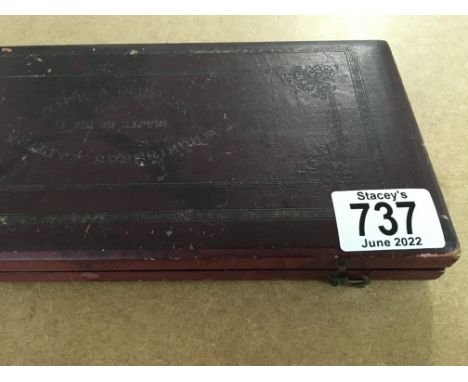 A cased watch maker tool set