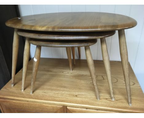 A nest of Ercol pebble tables