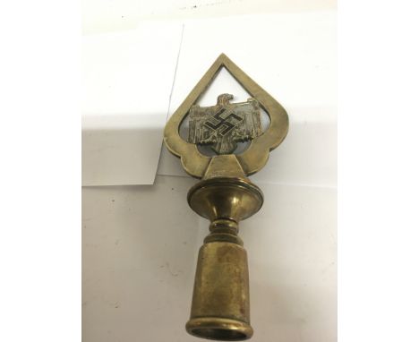 A German brass and enamel Third Reich flag mast tip.27cm