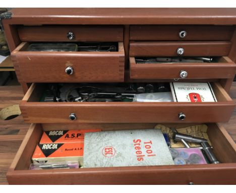 A collection of tools together with cased micrometer and protractor.