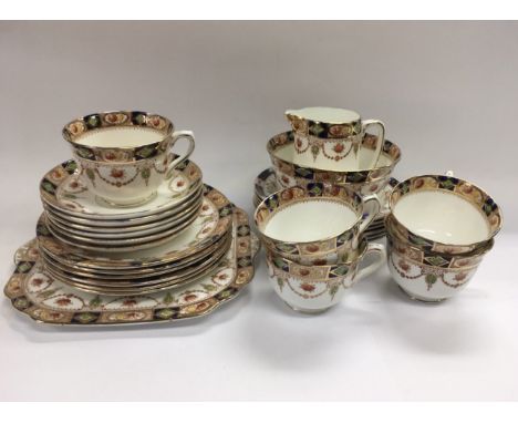 A Victorian Radford 12 place tea set.