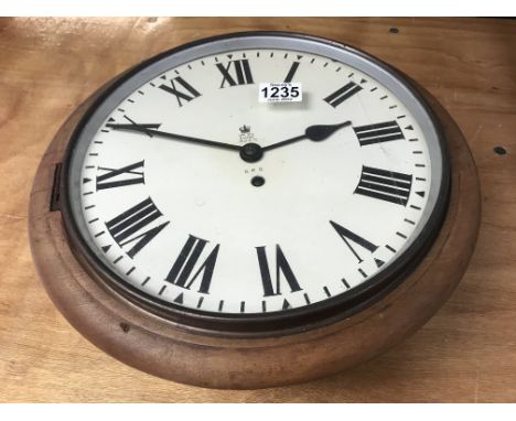 A G.P.O wall clock, the dial having Roman numerals. Size of dial 29cm approx