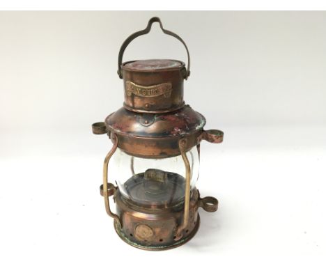 Small vintage copper ships anchor lamp with original burner by G.B seahorse trade mark