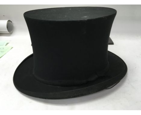 A Gibus folding top hat
