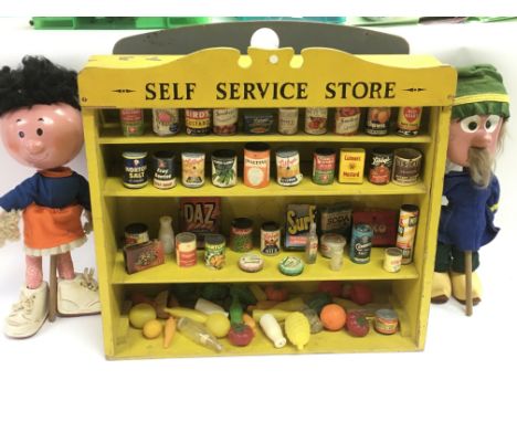 A vintage children's play grocery store display, two Magic Roundabout puppets, two boxed Snoopy toys, glove puppet and three 