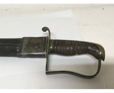 A Interesting British cavalry sword conforming to a 1796 pattern but possibly earlier with a leather scabbard brass belt butt