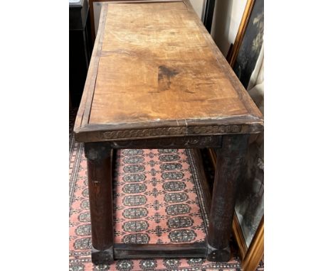 An early 19th century alter table with walnut inset top, borders carved with Celtic design mounted on 4 turned legs and stret