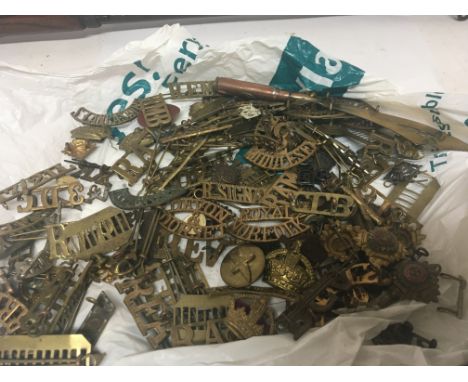 A good collection of I world war Regimental brass shoulder badges trench art enamel badges and oddments (a lot)