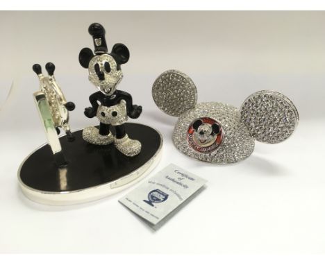 A limited edition Arribas Disney Swarovski figure of Mickey Mouse as Steamboat Willie together with a limited edition Disney 
