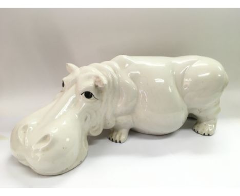 An Italian ceramic figure of a hippopotamus, approx length 54cm, some damage.