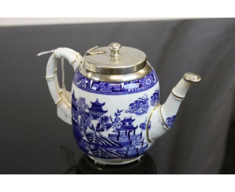 Victorian Royal Worcester silver topped blue and white teapot, pagoda decoration, the handle and spout in the style of bamboo