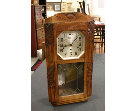 Art Deco 1930's French Walnut Cased Hanging Wall Clock, the silvered face with Arabic Numerals and marked ' Veritable Westmin