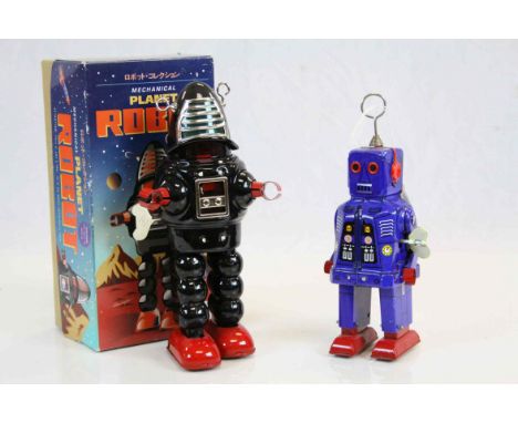 Boxed Japanese Mechanical Tin Plate Clockwork Planet Robot together with another Tin Plate Clockwork Robot