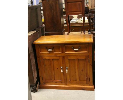 Pine Dresser Base with Two Drawers above Two Cupboards with Iron and Ceramic Handles, 100cms long x 46cms deep x 91cms high