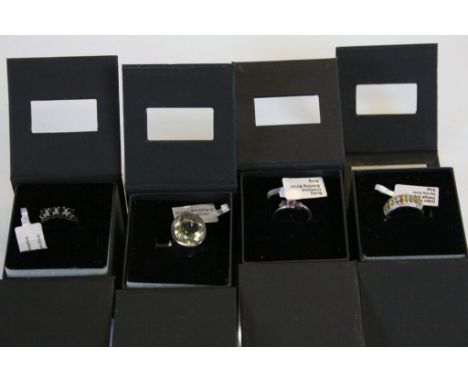 Four boxed Silver Gem set Rings by "Coloured Rocks" to include; Amethyst, Sapphire, Ruby/Diamond &amp; Green/Orange Sapphire