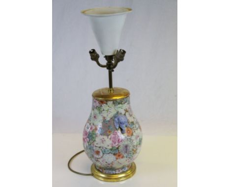 Chinese Ceramic Four Branch Table Lamp profusely decorated with enamelled flowers on a gilt ground and Two Blue Elephant Mask