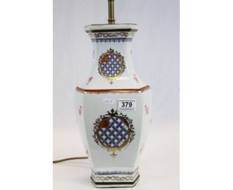 Chinese Export Armorial Style Ceramic Table Lamp with enamelled decoration of a Lattice Shield with Lion Heads (38cms high )