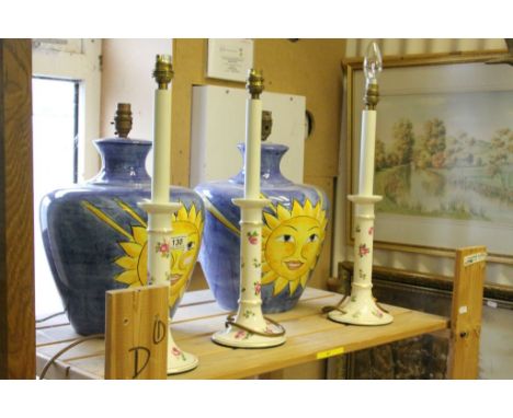 Pair of Blue Ceramic Table Lamps decorated with Sun Faces (approx. 33cms high) together with Three Candle Ceramic Table Lamps