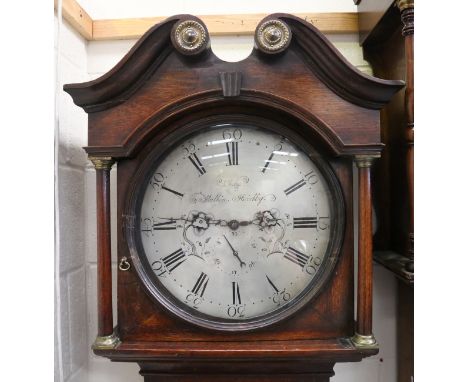 A George III oak longcase clock with thirty hour movement striking on a bell via an outside countwheel, the 14¼-inch circular