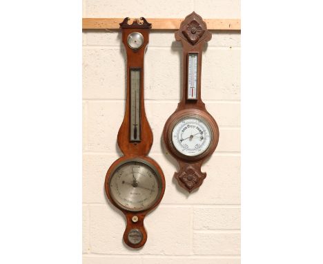 A George III mahogany wheel barometer with silvered dials, hygrometer, alcohol thermometer and spirit level, inscribed 'Lione
