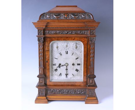 A late Victorian burr walnut cased bracket clock with eight day triple fusee movement chiming quarters on either eight bells 
