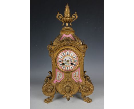 A late 19th century French gilt spelter and Sèvres style porcelain mantel clock with eight day movement striking on a bell, t